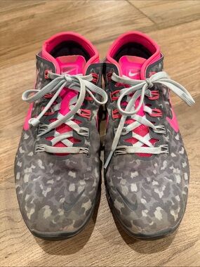 Nike Women’s Gray Camo Running Shoes with Pink Accents